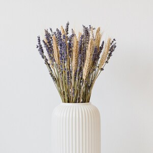 lavender and wheat in vase