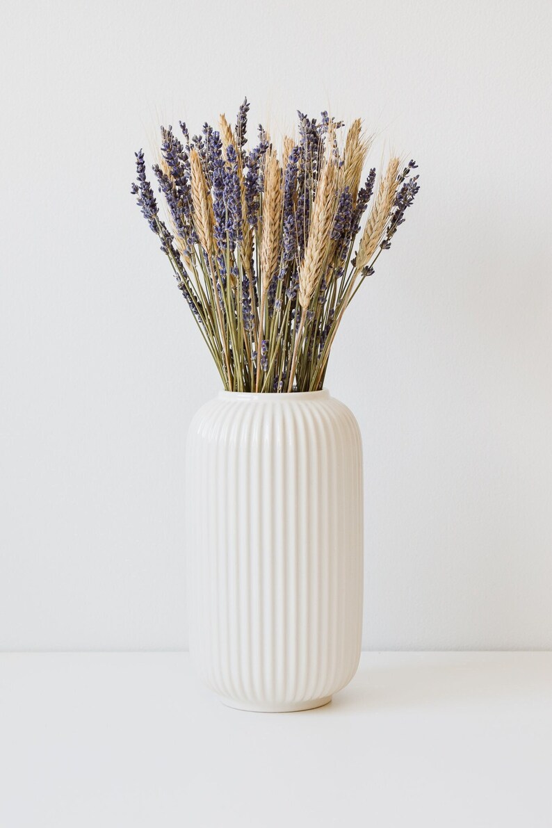 lavender and wheat in vase