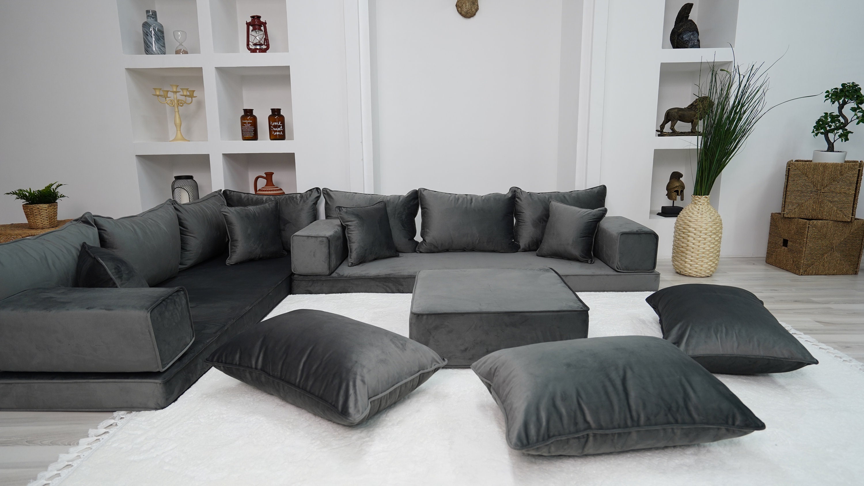 Grey couch with black pillows sale