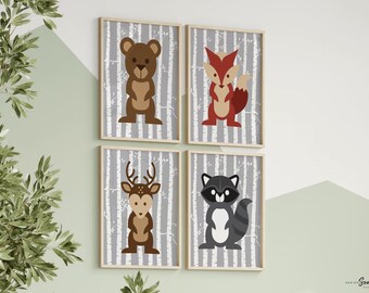 May include: Set of four framed prints featuring woodland animals on a birch tree background. The animals are a bear, fox, deer, and raccoon. Each print is in a light wood frame.