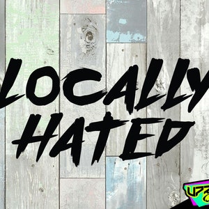 May include: Black and white graphic text on a wood background that reads "Locally Hated". The text is in a bold, brush-stroke font. A logo for "Uprise Offroad" is in the bottom right corner.