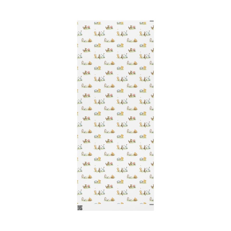 Flat lay of a sheet of wrapping paper featuring Classic Winnie the Pooh and friends playing.