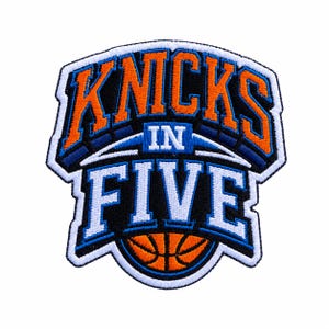 May include: An embroidered patch featuring the text KNICKS IN FIVE in orange, white, and blue thread. The word KNICKS is in orange, while IN FIVE is in white with blue outlines. A basketball graphic is at the bottom on a black background.