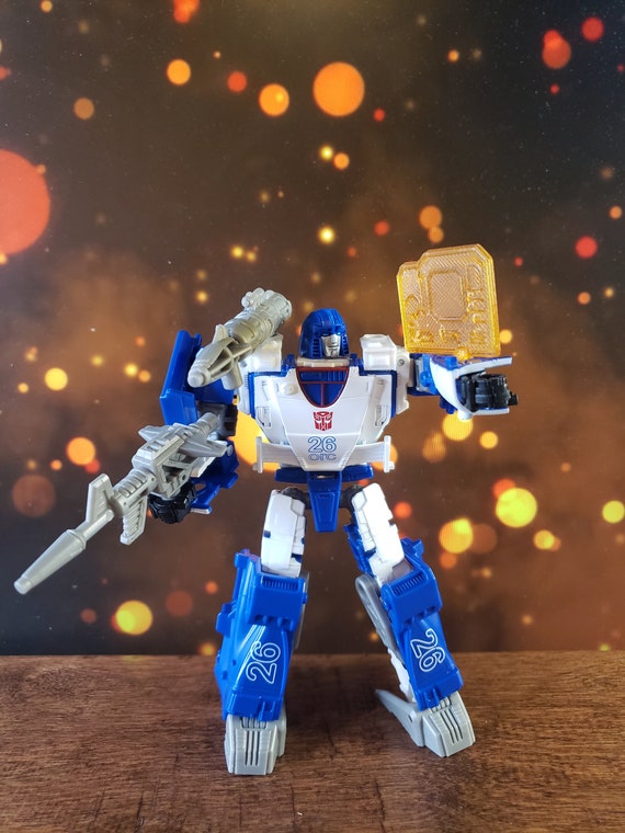 【大注目】 Transformers WFC Kingdom Mirage Shoulder Cannon Adapter アメコミ