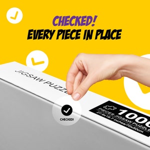 May include: A white box with the text "JIGSAW PUZZLE" and "CHECKED!" on it. The box is labeled "1000 PIECES JIGSAW PUZZLE" and has the dimensions "27.6x19.7 inches/70x50cm".