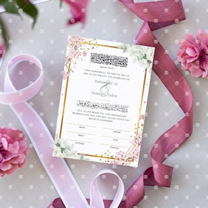 Puede incluir: Un certificado de matrimonio blanco con acentos florales dorados y rosados. El texto dice "Este acuerdo, firmado el 25 de mayo de 2022, certifica el matrimonio de Muhamed Ali y Sumaiya Zahra".