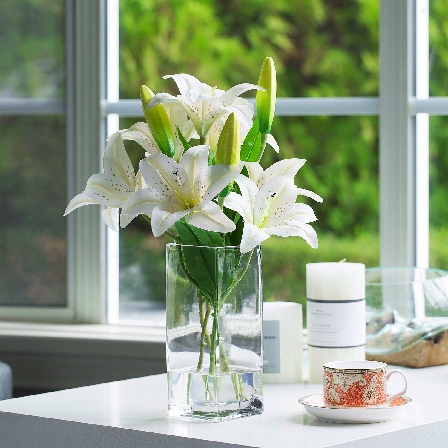 Artificial lily flowers in cheap vase