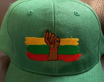 Fist with Yellow, Red, and Green Black Lives Matter Hat