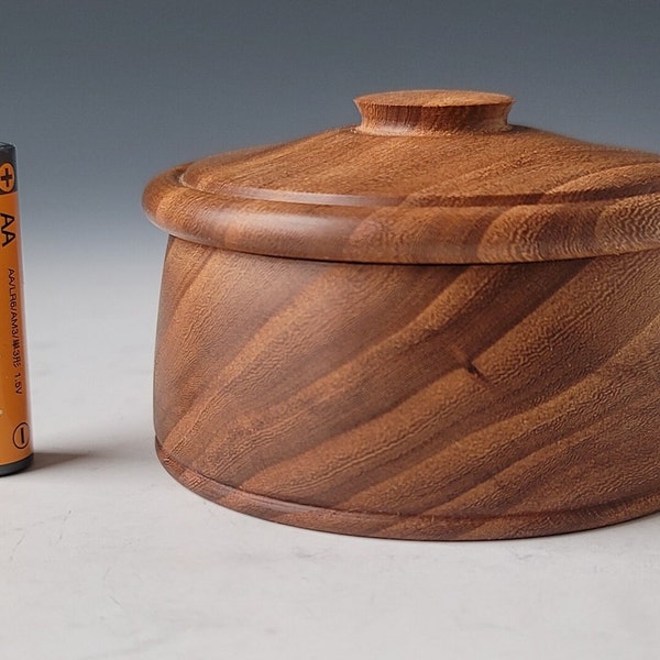 Hand turned lidded box made from red elm wood.