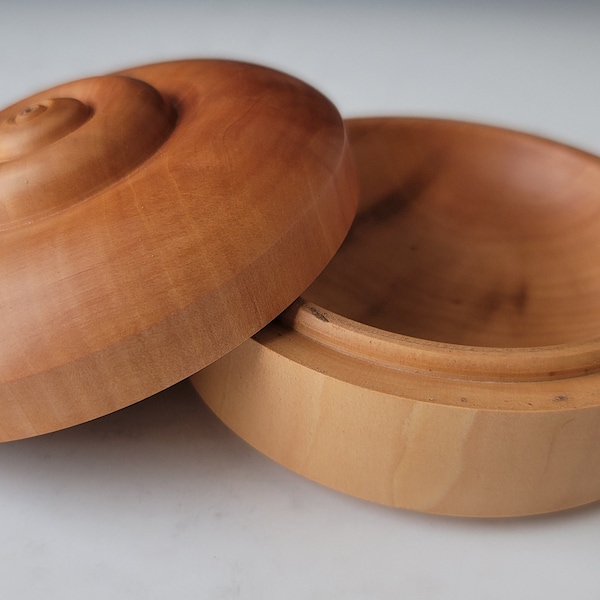 Hand turned lidded box made from cherry wood.