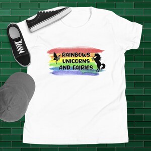 Rainbows, Unicorns and Fairies T-Shirt | Super Comfortable Unisex Fit | Watercolor Rainbow Background