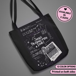 May include: Black tote bag with a white design featuring the text "Jimin's Production Diary" with musical notes, a heart, and a handwritten note that says "Park Jimin". The bag is available in 12 colors and is printed on both sides.