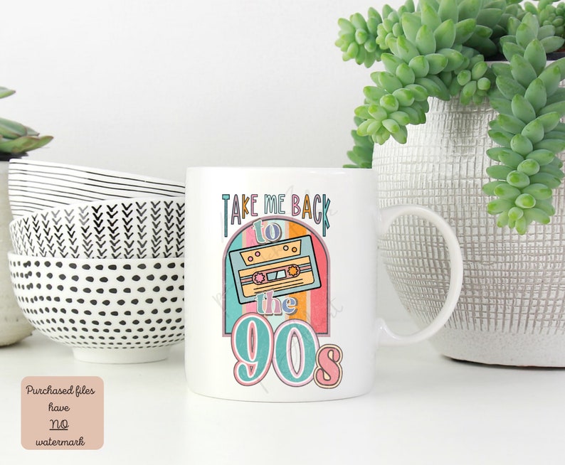 May include: White ceramic mug with a colorful graphic design featuring a cassette tape and the text "Take Me Back to the 90s".