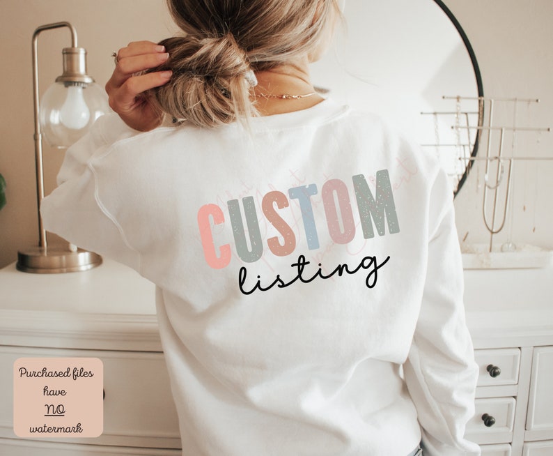 May include: White sweatshirt with the text "CUSTOM listing" in colorful letters with a glittery effect.