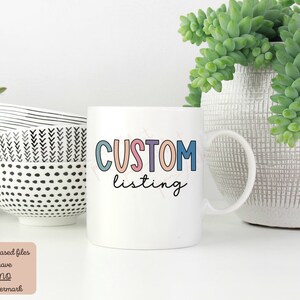 May include: White ceramic mug with a colorful "CUSTOM listing" design. The mug is sitting on a white surface with other bowls and a potted plant.
