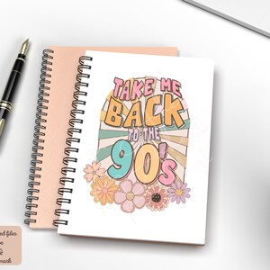 May include: A white notebook with a colorful graphic that says "Take Me Back to the 90's" with a retro sunburst design and flowers.