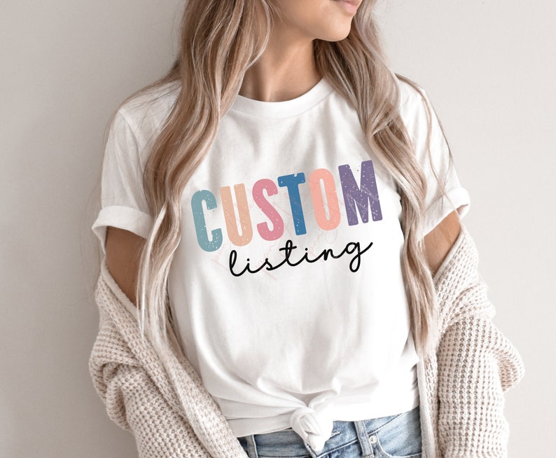 May include: White t-shirt with the text "CUSTOM listing" in colorful letters with a distressed look.