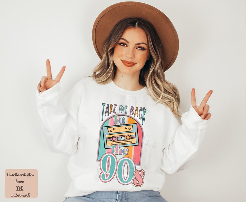 May include: White sweatshirt with a graphic design of a cassette tape and the text "Take Me Back to the 90s". The graphic is in a rainbow color scheme.