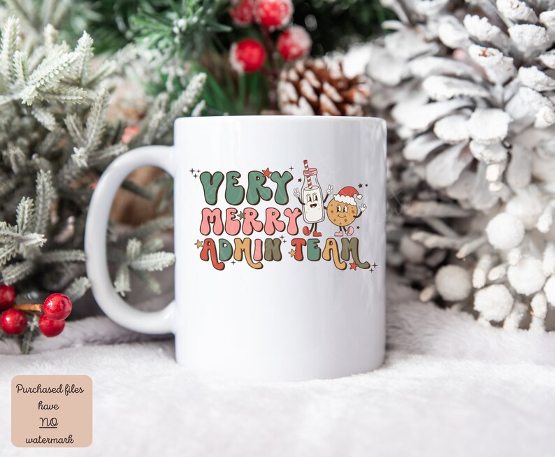 May include: White ceramic mug with a Christmas-themed design. The mug features a milk carton and a cookie with faces, wearing a Santa hat. The text on the mug reads "Very Merry Admin Team".