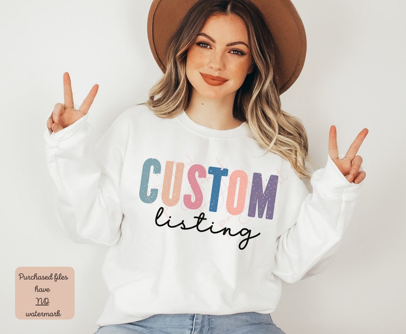 May include: White sweatshirt with the text "CUSTOM listing" in colorful, distressed letters. The letters are in shades of pink, blue, and purple.
