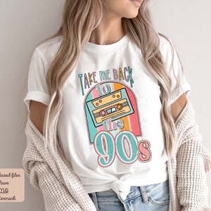 May include: White t-shirt with a retro design featuring a cassette tape and the text "Take Me Back to the 90s".