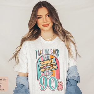 May include: White t-shirt with a retro design featuring a cassette tape and the text "Take Me Back to the 90s".