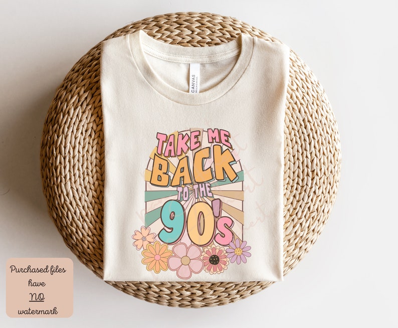 May include: A white t-shirt with a colorful graphic that says "Take Me Back to the 90's". The graphic is in a retro style with a sunburst design and flowers.