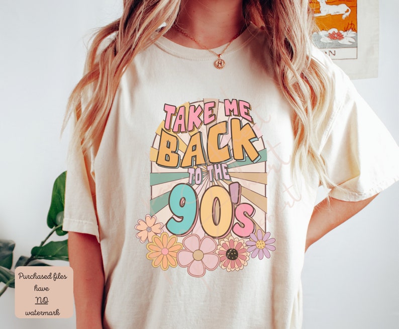 May include: A white t-shirt with a retro-style graphic that says "Take Me Back to the 90's" in colorful letters with a sunburst design and flowers.