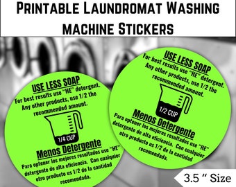May include: Two green and black circular stickers with the text "Use Less Soap" and "Menos Detergente" with a measuring cup graphic. The text reads "For best results use "HE" detergent. Any other products, use 1/2 the recommended amount." The stickers are 3.5 inches in diameter. The text "Multiple Colors!" is at the bottom of the image.