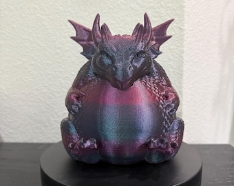 Hucha/alcancía con forma de dragón corpulento