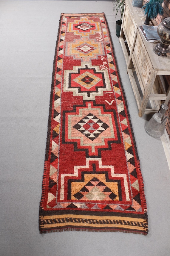 トルコキリムカラフルな幾何学模様のラグ