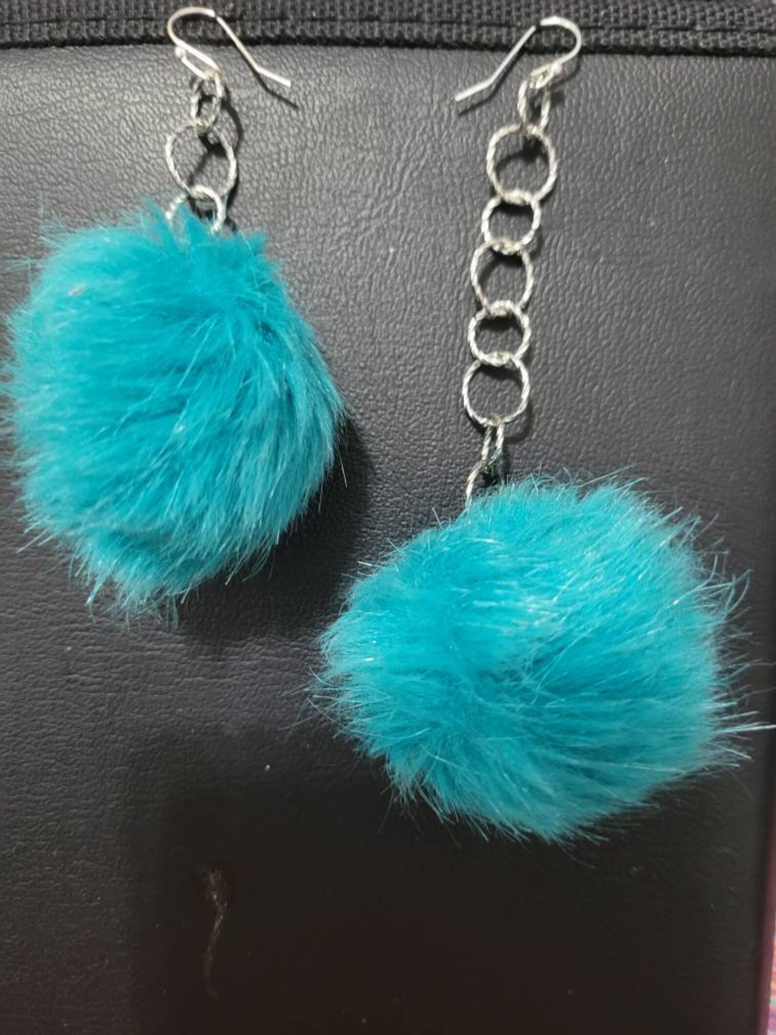 Puff ball dangling earrings Etsy