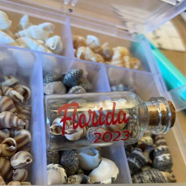 Vacation/honeymoon sand bottle keepsakes