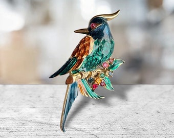 Spilla per uccelli da collezione con occhi cabochon in vetro rosso FIRMATA D'ORLAN rara.