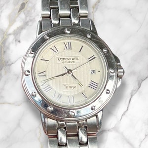 RAYMOND WEIL TANGO Silver Ss 5360 Ladies 5ATM Sapphire Crystal Quartz Swiss Made Reloj de ajuste rápido con fecha