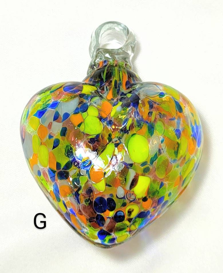 Mexican Artist Creates Glass-blown Hearts from Resort Bottles