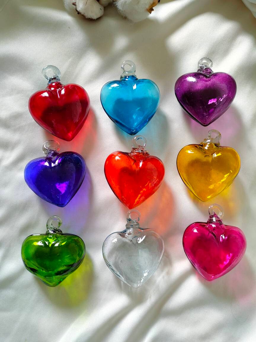 Mexican Artist Creates Glass-blown Hearts from Resort Bottles