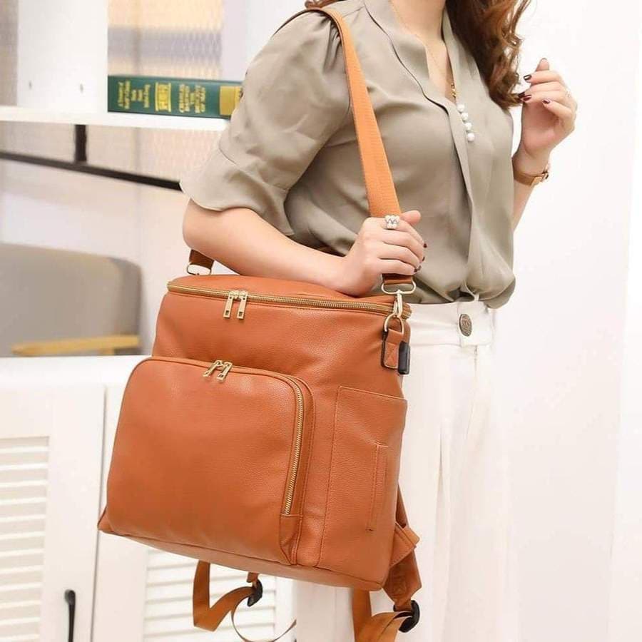 Mom hot sale leather backpack