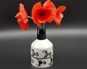 Hand painted, ceramic bud vase with beetle design, black and white