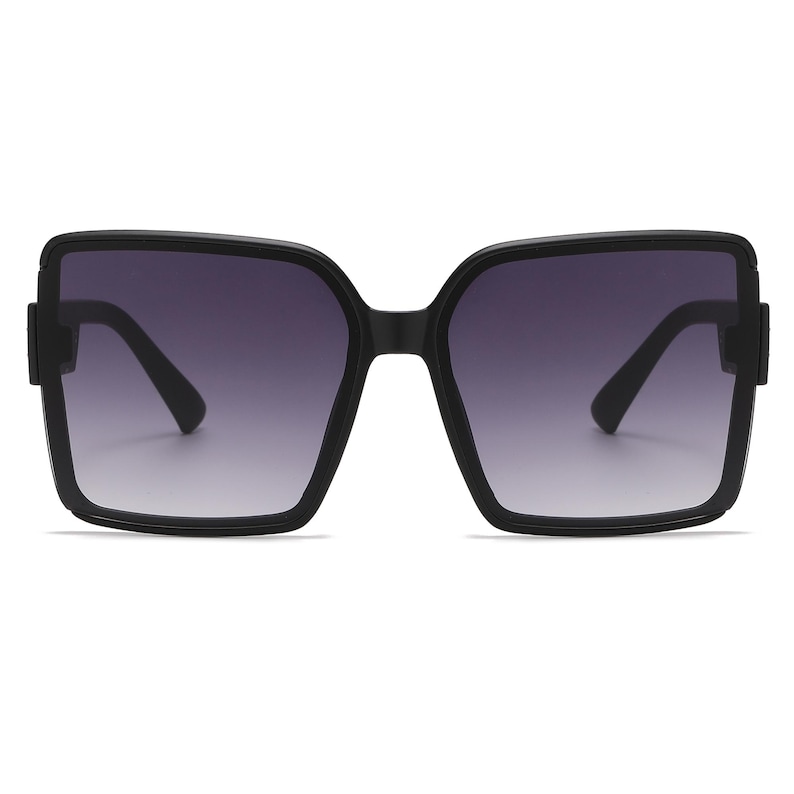 May include: Black square-framed sunglasses with gradient lenses. The sunglasses have a thick frame and a dark gradient tint that transitions from dark at the top to lighter at the bottom. The arms are also black.