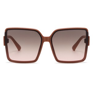 May include: Brown square-framed sunglasses with gradient lenses. The sunglasses have a thick frame and arms, and the lenses transition from a darker shade at the top to a lighter shade at the bottom. The overall design is modern and stylish.