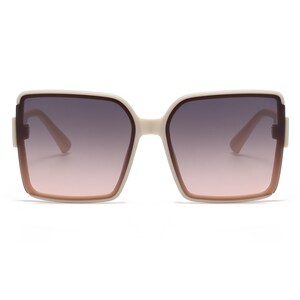 May include: Oversized square sunglasses with a cream-colored frame and gradient lenses that transition from dark gray to pink. The sunglasses have a thick frame and a classic, yet modern design.