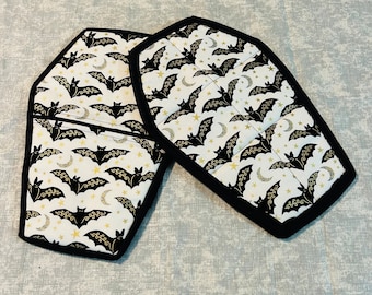 Bats trimmed in gold on white background coffin pot holders-set of 2