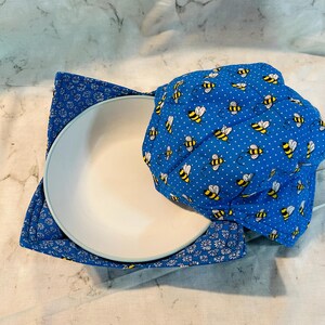 Bees buzzing around on these XL summertime bowl cozies.  Set of 2.