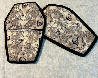 Vintage skulls with gothic designs around them coffin pot holders- set of 2
