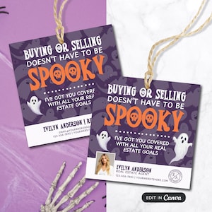 May include: Two Halloween-themed real estate tags. The tags feature the text "Buying or Selling Doesn't Have to be Spooky" on a purple background with ghost illustrations and the agent's contact information.