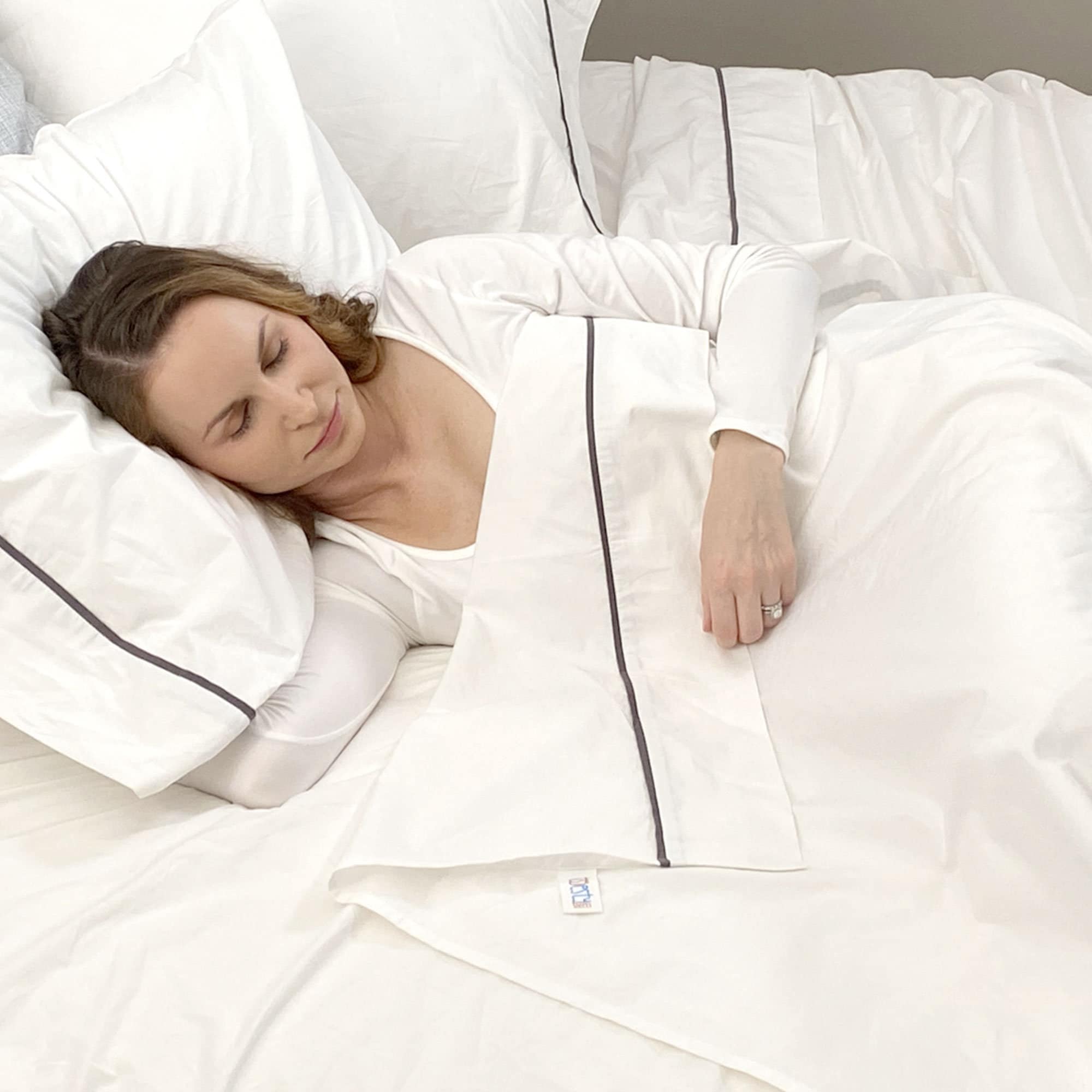 Toesty Sheets NO TUCK fitted top sheet sets by Michele Wytas — Kickstarter