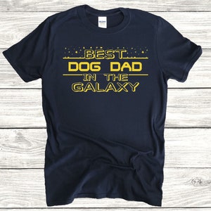 Mens Gift Best Dog Dad In The Galaxy Funny Dog T-Shirt Mens Gift Best Dog Dad In The Galaxy Funny Dog T-Shirt