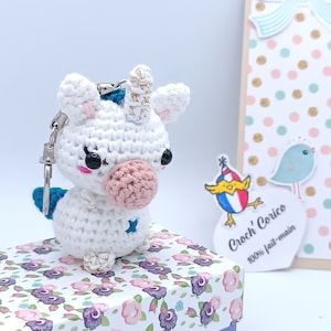 Licorne amigurumi réalisée au crochet (option porte clé) et sa boite d'emballage cadeau
