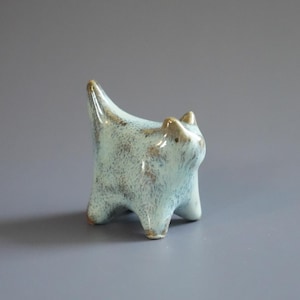 May include: A rustic wooden sign with the text "Welcome to our home" in white lettering. The sign features a distressed finish and a simple, inviting design, perfect for entryway decor.